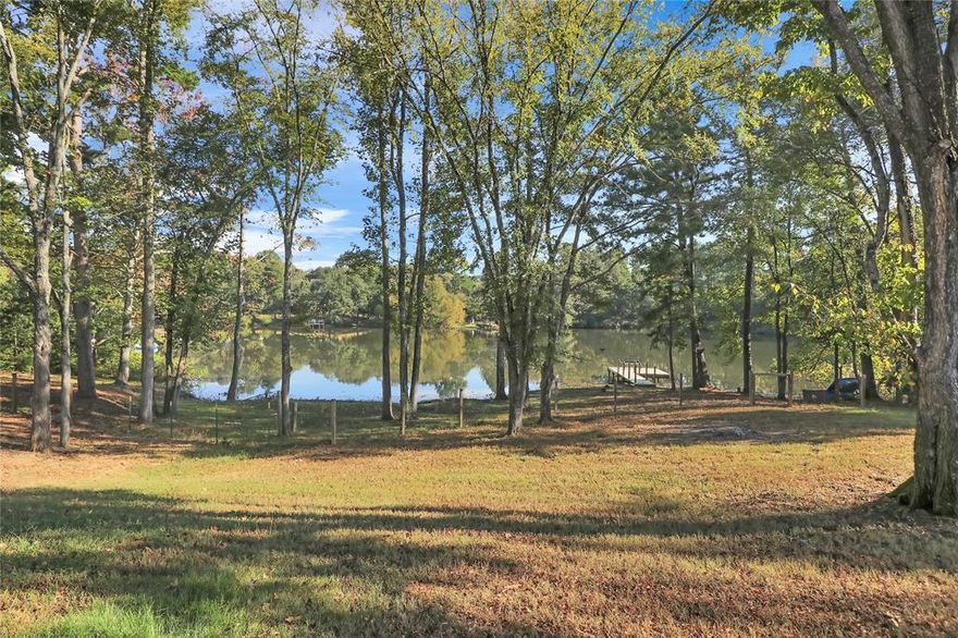 Whitehouse ISD, Troup address.  Waterfront Home on Private Lake. Located off Hwy 110 S.  4,2.5 home that is decorated so so cute! This home is loved and you can feel it when you walk in the door. Spacious open floor plan, farmhouse style. One family room, a study, 4 bedrooms and the garage- it still has the garage door, but inside the garage, the seller designed a flex space to include an exercise room along with two private home offices.Light and bright with windows looking to the lake. This home offers a welcoming atmosphere with plenty of space to relax and unwind. Enjoy peaceful mornings by the lake, casting a line or feeding the ducks. It’s been well-loved and is now waiting on its next chapter. Get ready to view this Happy Home.