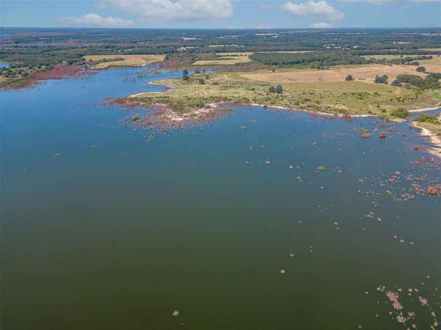 Prime waterfront land, zoned single family residential, one acre lots or larger, the recreational side of the new Bois d'Arc Lake.  This portion of the lake is less than an hour in proximity from the DFW Metroplex.  The easy access from the northern portion of the FM 897 bridge allows for a quick trip to nearby grocery stores, restaurants and shopping.  This 226 acre + or - parcel is currently zoned for single family homes and has a wildlife tax exemption.   Old Oak trees, rolling hills and a prime location near the lake bridge with lake views as well as plentiful water front.  This lake front parcel is ideal for a development.  Buyer and their agent are responsible for verifying any and all information related to this listing and a appropriate due diligence period will be granted.