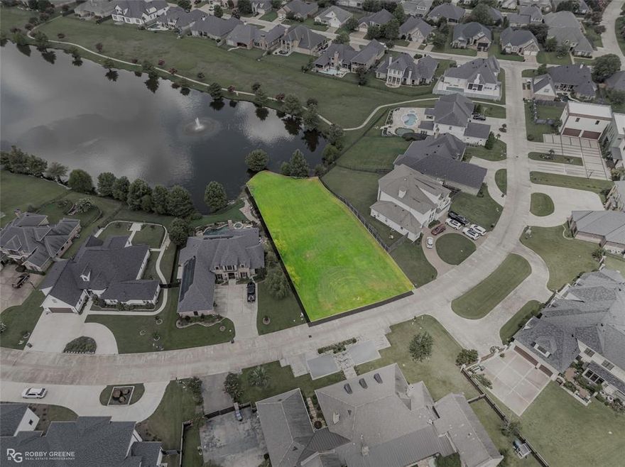 Build Your Dream Estate on the Water at 7926 Batture Drive, Shreveport, LA 71115 – The Haven Subdivision! This rare and remarkable waterfront lot offers an unparalleled opportunity to create a custom home in the heart of one of Shreveport’s most exclusive gated communities. Located on Batture Drive, this premium homesite features a gentle slope down to a beautifully maintained pond with tranquil fountain views, creating a peaceful and scenic backdrop right in your own backyard. Situated between two luxury residences, this expansive lot offers both privacy and prestige with lush green surroundings and established neighboring estates. The serenity of waterfront living paired with the convenience of city amenities. The Haven is a gated, guarded community featuring miles of walking trails, manicured common areas, direct access to the Red River, and a strong sense of neighborhood pride. Located just minutes from shopping, dining, hospitals, and top-rated schools, this location is ideal for those seeking a balance of seclusion and accessibility. Utilities are readily available, and the lot is cleared and ready for construction. With limited lakefront properties remaining in The Haven, this is an exceptional opportunity to invest in your future. Whether you're building your forever home or a luxury retreat, this homesite offers prestige, peace, and proximity in one perfect package.