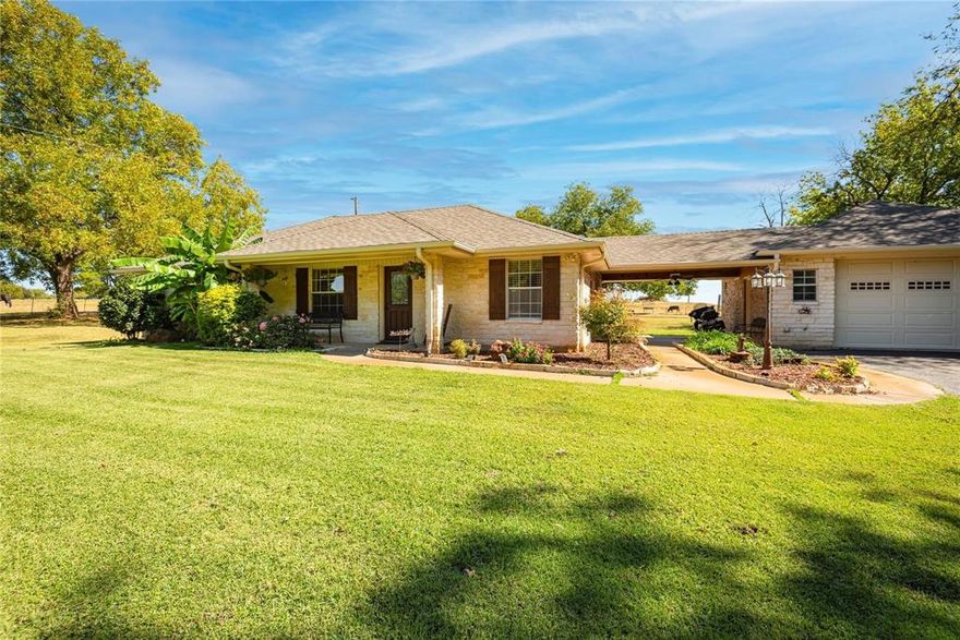 Escape to peaceful country living on a private road with no through traffic and NO HOA, in this charming 4-bedroom, 3-bath home on 2 acres, with the rare opportunity to purchase additional land—up to 19 acres total across two tracts. The seller is willing to divide, giving you the flexibility to choose the perfect amount of acreage to suit your lifestyle, with pricing based on your selection. Inside, the home offers a welcoming flow with a spacious living room that opens to the kitchen and large dining area. The chef’s kitchen boasts two cooktops—a drop-in electric range plus a separate cooktop—double ovens, granite countertops, stainless steel appliances, an undermount sink beneath kitchen window, and abundant cabinets with pantry storage. Hardwood, slate, and ceramic wood-look tile flooring enhance the home’s warmth with no carpet in sight. The split primary suite easily accommodates king-size furniture and includes a garden tub, separate shower, dual vanities, and a generous walk-in closet. Secondary bedrooms are comfortably sized, with one featuring its own ensuite bath—perfect for guests, multi-generational living, or a second primary suite. A breezeway connects the home to the detached 2-car garage with its own AC unit, while outside you’ll find two storage barns, a dog run, and an 11-zone sprinkler system. With Carrier and Trane HVAC systems (2015 and 2019), a custom roof just 5 years old, and seller financing available, this property combines modern comfort with country charm—all just minutes from I-30 for an easy commute.