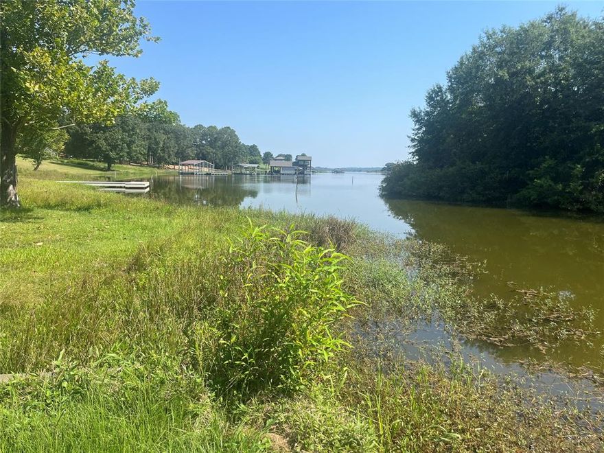 Rare opportunity to purchase a 6 acre waterfront property with partial retaining wall on 100 + ft shoreline in the gated community of Eagle Shores on Lake Bob Sandlin. Property includes both lot 1 and lot S-6, they will not be sold separately. Construct a dock on your waterfront for prime fishing in this secluded quiet spot. Several prime sites to build your Dream Home with pastoral views of your property and a stunning view of the lake. Family and friends can enjoy lake side living and make memories to last a lifetime. Don't miss this opportunity! Schedule your appointment today!