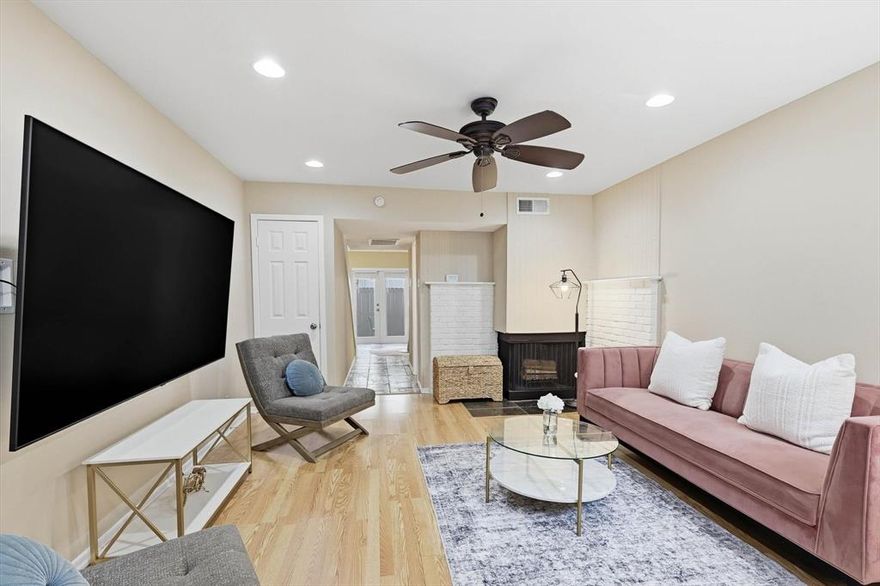 PREVIOUSLY ON HOLD FOR NEUTRAL PAINT UPDATE. SHOWINGS TO RESUME THIS FRIDAY MAY 8th at 9AM. 

1st floor, 2 story condo with fenced turf yard. 2bed. 1.5 bath. covered parking. Gated community. All appliances + washer dryer staying. Welcome to the heart of Oak Lawn and Cedar Springs in Uptown Dallas! This fabulously updated 2-story condominium offers stylish, low-maintenance living in one of Dallas’ most vibrant and walkable neighborhoods. Featuring updated laminate wood flooring throughout both levels, fresh interior paint, fully updated bathrooms, modern light fixtures, and a beautifully refreshed private patio with new fencing and turf yard.

The open, updated kitchen includes stainless steel appliances, granite countertops, and french patio doors. The spacious living room showcases a stone decorative wood-burning fireplace, creating a cozy focal point. Both bedrooms are located upstairs and have been completely updated, along with a beautifully updated full bath. A convenient half bath is located downstairs. Full list of Updates & Features in MLS Docs. 

Seller is leaving all appliances, including the washer, dryer, refrigerator, kitchen table, and chairs. Assigned covered parking included. Fantastic location near Lemmon Ave, Restaurants, Whole Foods, Oak Lawn nightlife, Turtle Creek, Dallas North Tollway, the Medical District, Woodall Rodgers, and I35. Completely updated with bright & light cozy feel. HOA covers insurance, water, trash, sewer, gas, maintenance, security, covered parking, gated entrances.