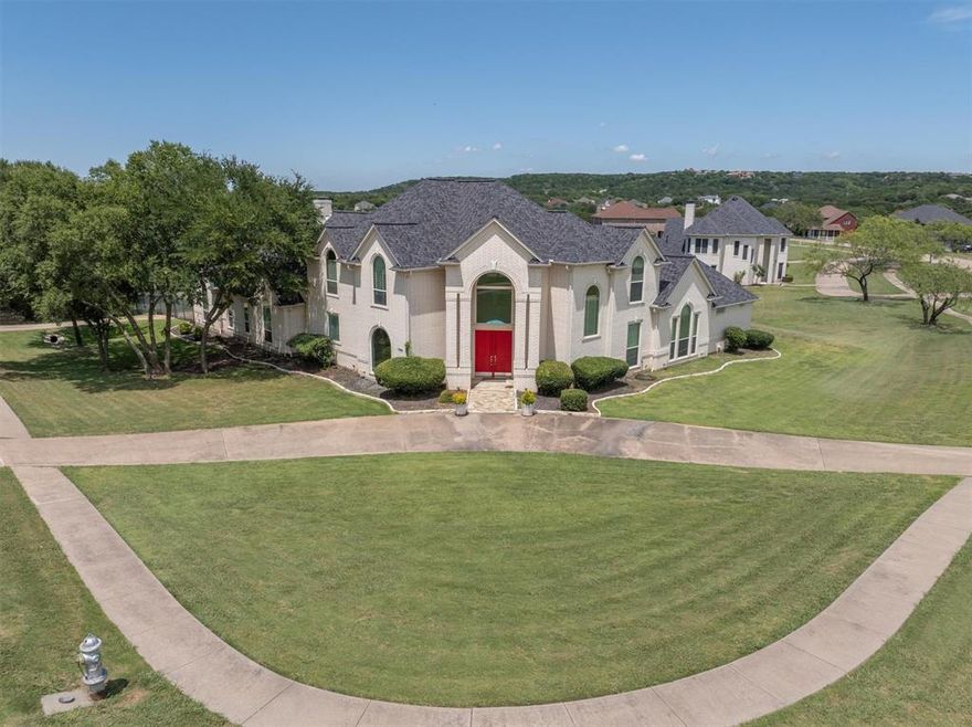 Welcome to the Elegant Estate located at 420 Rolling Oaks Ridge, Cedar Hill! Captivating Residence boasts an Extensive Living Space of approximately 4,832 square feet, nestled on a Generous One Acre Corner Lot. Greeted w Circle Drive, Soaring Ceilings, Step Down to Parlor w Views of Sparkling Pool, Formal Dining Room...Continue to the Open Concept Living Area w Corner Fireplace onlooking Nook & Appealing Kitchen...Stone Accent Breakfast Bar, Granite Countertops, Island, Double Ovens & Walkin Pantry. Secluded Owners Suite offers a Cozy Ambiance w Double Sided Fireplace & Ensuite Bath w Separate Vanities, Separate Walkin Shower, Jetted Tub under the Double Sided Fireplace, His & Her Walkin Closets. Secondary Bedroom w Ensuite Bathroom Downstairs...Perfect for the Inlaws. This Home Offers a Plethora of Entertaining Space for an Occasion...Multiple Staircases to the Gameroom, Media Room w Wet Bar & Family Room, as well as 3 Generous Size Secondary Bedrooms & 2 Full Bathrooms. Outdoor lovers will appreciate the Covered Patios that Provide Ample Shade, as well as the Balcony onlooking Treed Green Space & Views of Joe Pool Lake. Electric Gate to 4 Car Garage...Perfect for the Car Enthusiast. This Property Puts You Just Around the Corner from Shopping, Dining & Rich Beauty of Cedar Hill with Numerous Trails for Hiking, Biking & Scenic Views from Local Parks.