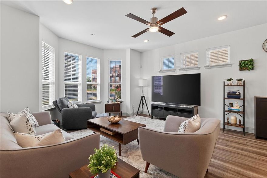 Step into this gorgeous open-concept home featuring dramatic ceilings, seamless flow between living, dining, and kitchen spaces, and luxurious vinyl plank flooring. The deluxe chef’s kitchen boasts stainless steel appliances, a 5-burner gas range, hand-laid designer tile backsplash, custom 42-inch shaker cabinets with hidden hinges, kitchen island and thoughtful storage solutions including pot-pan drawers, trash roll-outs, cookie tray dividers, and flip trays at the sink. Under-cabinet lighting enhances both function and ambiance. Energy-efficient and modern interior features include satin nickel fixtures and hardware, 5-inch baseboards, 16 SEER HVAC, tankless water heater, radiant barrier roofing, zoned heating and cooling, and a Wi-Fi programmable thermostat. The spa-inspired bathrooms feature custom cabinetry, frameless shower glass, ceramic tile walls, pedestal sink, elongated commodes, and designer hardware. Upstairs, enjoy a flexible game room, three bedrooms with upgraded frieze carpet, and oversized closets for ample storage. Perfectly located near shopping, dining, and major highways, this home combines style, convenience, and top-tier Allen ISD schools an ideal choice for families seeking comfort and modern living. Key Features: End-unit, Open concept, Chef’s kitchen, Stainless steel appliances, Luxury vinyl flooring, Energy-efficient upgrades, Game room-flex space, Oversized closets, Allen ISD, Prime location.