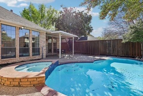 Photo of 8709 Bayshore Lane, Rowlett, TX 75088 (MLS # 21211777)