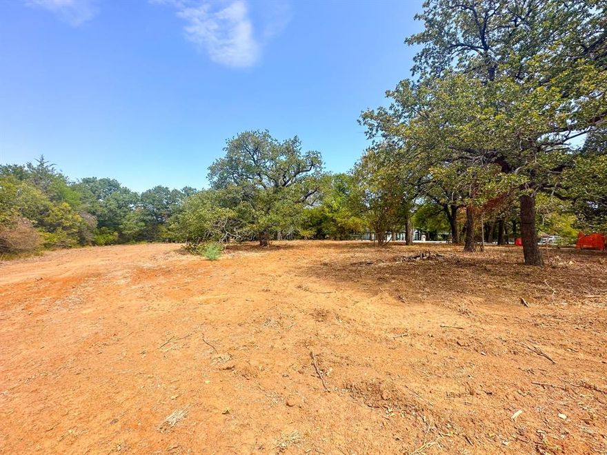 Gorgeous, secluded lot with no HOA restrictions in Carroll iSD. A wonderful opportunity to build your custom home that's close to Hwy 114 and Grapevine Lake.