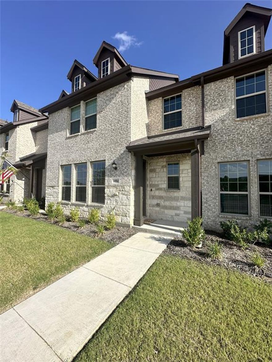 Special $Financing$ Offered -  LOW BILLS, NO MAINTENANCE Living in Keller ISD! This 2023-built townhome delivers the ultimate LOCK & LEAVE LIFESTYLE, combining modern convenience with ZERO EXTERIOR MAINTENANCE and LOWER MONTHLY BILLS. This immaculate 3-bed, 2.5-bath home with a 2-car garage is truly LIKE NEW and a must-see. The bright, open-concept first floor is ideal for entertaining, featuring STYLISH WOOD-LOOK TILE and a large family room. The INVITING KITCHEN is the heart of the home, boasting an OVERSIZED ISLAND, ENDLESS GRANITE COUNTERTOPS, stainless steel appliances, a window with a view out front, ABUNDANT CABINET STORAGE, and a HUGE WALK-IN PANTRY. Upstairs, all bedrooms are conveniently located near the SECOND-FLOOR LAUNDRY. Relax in the spacious PRIMARY SUITE with two WALK-IN CLOSETS and a well-appointed ensuite bath with dual sinks and an oversized shower. BRAND NEW BLINDS and an abundance of natural light complete the polished feel. Enjoy the PET-FRIENDLY GATED FRONT YARD where your furry friends can play. EXTERIOR MAINTENANCE IS FULLY COVERED BY THE HOA (including mowing, landscaping, watering, and the roof). Furthermore, benefit from LOWER MONTHLY COSTS thanks to energy-efficient construction, a Trane HVAC system, and REDUCED HOMEOWNERS INSURANCE due to the HOA covering the exterior structure. This home is MOVE-IN READY and perfectly situated minutes from DFW Airport, major highways, shopping, and dining, all while located in HIGHLY RATED KELLER ISD. $Offers with pre-approval from Tristan Sherrill- receive a FREE appraisal and 1-0 RATE BUYDOWN for loans closed through Tristan Sherrill - NMLS 299820.