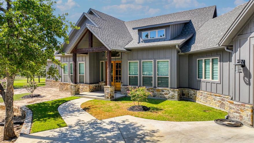 The stunning details of this home & property will leave you speechless! The almost 9-acre park like property is loaded with beautifully limbed oak trees & in a gated community with resort quality amenities only 1-hour from Fort Worth. Additionally, this fully fenced luxury estate backs up to the Texas Parks & Wildlife Dept’s Fawcett Wildlife Mgmt Area giving abundant privacy. The 2,600+ SF home is only 2 years old & was custom designed & built to take advantage of all the pristine location has to offer. Large windows throughout the home allow abundant natural light to enter. Luxurious hardwood floors, a beautiful color palette, ceiling beam work throughout, massive back porch, premium finishes everywhere one looks & benefiting from impeccable care. The pride of ownership is impossible to miss! This is an opportunity to enjoy a true custom home without the wait & in almost new condition. Currently set up as 2 bedrooms with 2.5 baths, but the study could make a 3rd bedroom if desired.