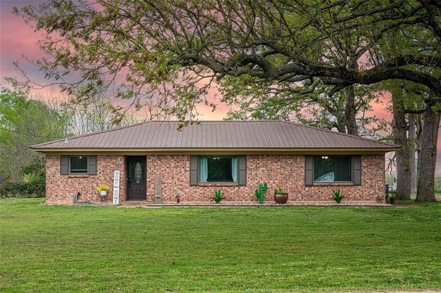Welcome to this beautifully updated 4-bedroom, 2-bathroom brick home in Prairiland ISD, offering 1,788 square feet of comfortable living space. Nestled in a peaceful rural setting, this home provides the perfect blend of modern amenities and tranquil surroundings. The open-concept living area seamlessly flows into the kitchen, creating a spacious and inviting atmosphere. The kitchen is equipped with updated appliances. A neutral paint palette and hard surface flooring throughout the home make maintenance a breeze. The split bedroom arrangement offers privacy, with the primary bedroom featuring an ensuite bath with a luxurious jetted tub and a separate shower. The three additional bedrooms provide ample space for family and guests. Outside, enjoy the serenity of over half an acre of land. The fenced backyard provides a safe and private area for outdoor activities. A two-car carport offers convenient covered parking, and there’s additional exterior storage for all your tools and equipment. Only 6 miles from Prairiland ISD and 16 miles to Paris Junior College - the perfect rural setting and short commute! *FHA Assumable loan option! Ask agent for details!!
With its rural charm, updated features, and spacious layout, this home is a must-see!