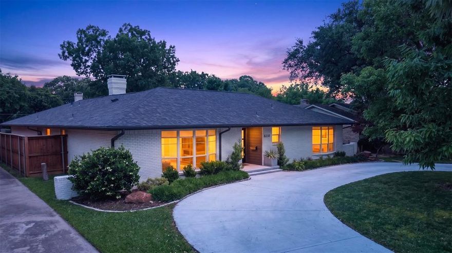 Beautifully redesigned with a fresh, modern vision, this East Dallas ranch blends timeless character with elevated finishes throughout. Featuring 3 bedrooms, 2.5 baths, and a rare 3-car garage, this home offers a functional layout designed for both everyday living and effortless entertaining.

UPGRADES: newly poured circular drive and front porch, fireplace, living room accent wall

At the center of the home, the designer kitchen impresses with custom cabinetry, quartz countertops, stainless steel appliances, a spacious island, and a dedicated bar area—all opening seamlessly to a warm and inviting living room anchored by a custom fireplace. The reimagined floor plan creates a natural, open flow, enhanced by real white oak flooring throughout.

The private primary suite and two additional bedrooms are complemented by two spacious bathrooms featuring dual-sink vanities and updated finishes. A conveniently located half bath sits just off the utility room, adding both function and flexibility.

Extensive updates include a freshly painted front façade, redesigned front porch, new front door, custom fireplace, and a newly poured driveway, creating standout curb appeal from the moment you arrive. The covered patio offers the perfect setting for relaxing evenings or hosting guests outdoors.

Ideally located in the established Andover Meadows subdivision, this home is surrounded by mature trees and well-kept homes, offering a quiet residential feel with close proximity to everything East Dallas has to offer. Just minutes from White Rock Lake and Dallas Arboretum and Botanical Garden, enjoy scenic trails, outdoor recreation, and some of the most beautiful natural spaces in the city. Nearby Lakewood Dallas and Lower Greenville provide a vibrant mix of dining, shopping, and entertainment, while convenient access to Downtown Dallas and major highways makes commuting simple.

Location, design, and lifestyle, this is a home that truly must be experienced in person.