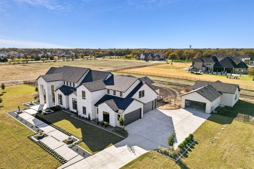 Welcome to 421 Calabrese Ct, a J. Anthony Custom Home under construction and located in the prestigious community of Fairview, within highly acclaimed Lovejoy ISD. This extraordinary property sits on a spacious lot and offers the perfect blend of luxury, functionality, and versatility.
The main residence features 5 bedrooms, 5 full and 2 half baths, and a spacious 4-car garage. Designed for both comfort and entertaining, the open-concept layout is complemented by top-of-the-line finishes, soaring ceilings, and thoughtfully designed living spaces throughout. A gourmet kitchen, spa-inspired primary suite, and expansive living and dining areas make this home ideal for modern living. A pool rendering and plan are available for buyers to preview, allowing you to envision your own backyard oasis. Adding even more flexibility, the property includes a separate casita or guest home, offering 1,142 sq ft of private living space complete with 1 bedroom, 1.5 baths, a full kitchen, living area, and its own dedicated 2-car garage perfect for multi-generational living, guests, or a private home office. This one-of-a-kind property offers the best of Fairview living with excellent schools, shopping, dining, and quick access to major highways, all while enjoying the privacy and tranquility of an exclusive neighborhood.