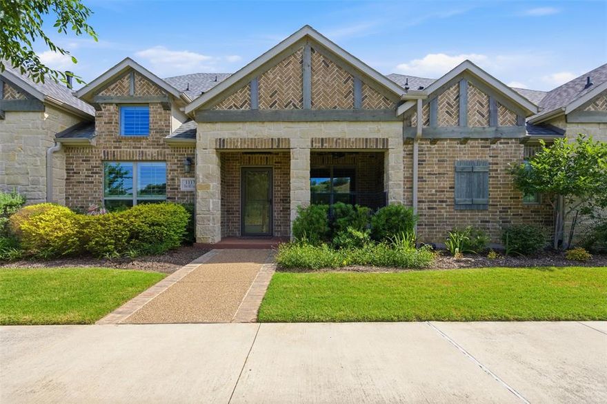Fabulous one-story villa townhome in the prestigious Viridian master-planned community, ideally situated on a water-facing lot with a charming covered front porch. This home offers an open floor plan with expansive vaulted ceilings, a center-island breakfast bar, granite countertops, gas range, upgraded stainless-steel appliances, and an oversized pantry in the kitchen. The primary suite includes a private ensuite with double-sink vanity, large walk-in shower, and an oversized walk-in closet. Additional features include bullnose corners, upgraded tile-plank flooring, Synergy Home System, and main-house water shutoff. Community amenities include miles of walking, jogging, and biking trails, community pool, clubhouse, sailing club, parks, greenspace and great bird watching.