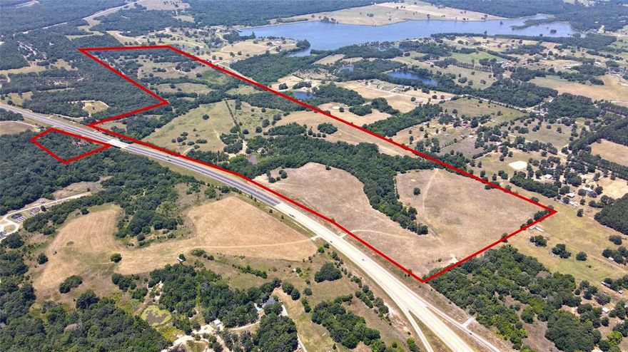 ATHENS, TX - Approximately 211.98 rolling acres located on Loop 7. This property is highlighted by rolling terrain, scenic vistas, a creek, natural springs, and open and wooded areas. Where East Texas Begins! An additional 65.33 acres located on the south side of Loop 7 is also available - See Broker for details.