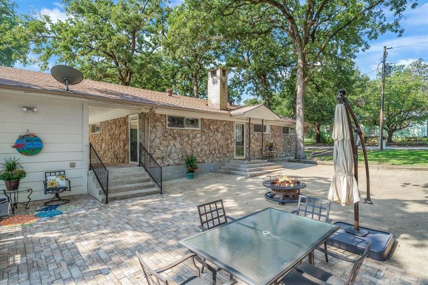 The star of this home is the location and the expansive outdoor patio and green space — made for entertaining, family gatherings, and unwinding after a day on Cedar Creek Lake. FIRE UP THE GRILL, POUR A COLD ONE, AND LET’S GET THIS PARTY STARTED!
The home is designed with fun in mind, inside and out. You’ll love the open living and dining areas, large kitchen, and cozy brick fireplace. There’s room for all your toys too — covered storage for your boat, RV, and jet skis. Plus, the community pier and boat launch are just down the street. Drop a line, take a swim, or shove off for a day on the water. Set in a beautiful, treed neighborhood, this property offers the lake lifestyle without the waterfront price tag. Perfect as a weekend getaway full-time home, or short-term rental -- it's quick commute from the DFW Metroplex.