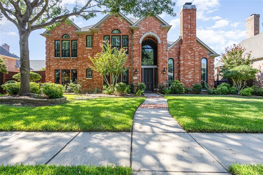 Welcome to Refined Living in a Premier Dallas Neighborhood

This impeccably maintained residence offers timeless elegance blended with modern comforts.

A broad entry sets the stage, flanked by formal living and dining areas highlighted by a captivating modern chandelier with a coordinating fixture in the dining room. Hardwood floors flow seamlessly throughout the downstairs and up the curved staircase, while elegant tile graces the wet areas for a sophisticated balance of style and practicality. Just beyond, walls of floor-to-ceiling windows frame views of the sparkling pool and spa, filling the family room with natural light. Anchored by a dramatic fireplace on one end and the open chef’s kitchen on the other, this space is the true heart of the home.

The updated kitchen is designed for both beauty and function, featuring counter-height seating, a custom built-in refrigerator, stainless steel appliances, and an induction cooktop (with gas available if preferred).  The sink and faucet are also commercial grade.

The primary suite is a serene retreat with tranquil pool views and private access for a midnight swim or spa soak. The ensuite bath evokes a spa-like experience, with cove lighting and luxurious finishes enhancing every detail.

This versital floor plan offers a handsome study with built-ins, which could serve as a fourth bedroom with access to a full bath. Upstairs, two bedrooms are joined by a Jack-and-Jill bath along with a spacious game room, ideal for relaxation or entertaining.

Situated in an exceptional neighborhood with highly rated schools, this home blends location, luxury, and lifestyle—offering the perfect setting for your next chapter.