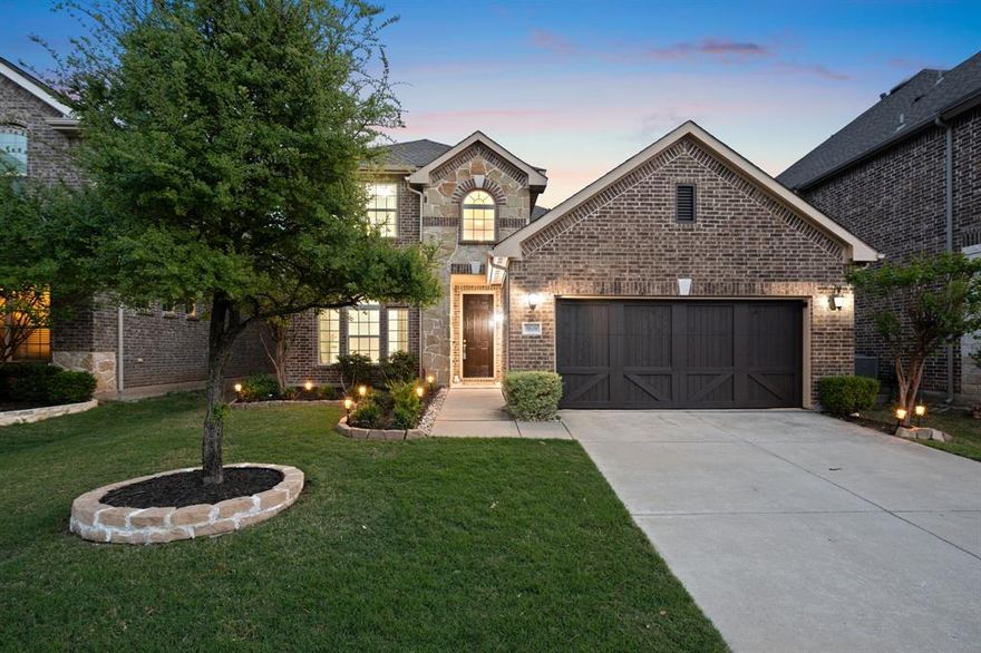 POTENTIAL FHA ASSUMABLE LOAN AT 2.65%!!! Welcome to this northwest-facing, single-owner custom home on a premium oversized lot with no rear neighbors in the highly sought-after Vineyards community of McKinney. Built by Impression Homes in 2018, this meticulously maintained home offers 2,610 sq ft, 3 bedrooms, 2.5 bathrooms, a dedicated office, and a spacious game room—perfect for everyday living and entertaining. Enjoy abundant natural light, an open-concept layout, and a seamless flow from the kitchen to the main living area. A brand-new custom electric fireplace with built-in cabinetry adds a modern focal point. The first floor features luxury vinyl flooring with a 30-year warranty, along with updated lighting in the kitchen and dining. Ceiling fans are installed in all bedrooms, the living room, and game room. The private first-floor primary suite includes a cozy reading nook—ideal for a nursery, workspace, or relaxation. Upstairs offers spacious secondary bedrooms and a versatile game room. Upgrades include solar panels (2023), HVAC serviced twice yearly, EV charging outlet, epoxy-coated garage floors with finished, painted walls, new roof (2019), and new gutters (2025). The premium lot backs to a tree line for added privacy and scenic views. Enjoy an extended concrete patio and a custom metal pergola built for durability and low maintenance. Zoned to top-rated Allen ISD with quick access to Highway 121 and Stacy Road—less than 10 minutes from Costco, Starbucks, The Hub, and Allen Premium Outlets. Community amenities include a pool and playground. A rare opportunity to own a well-maintained home in a prime location -  Schedule your showing today!