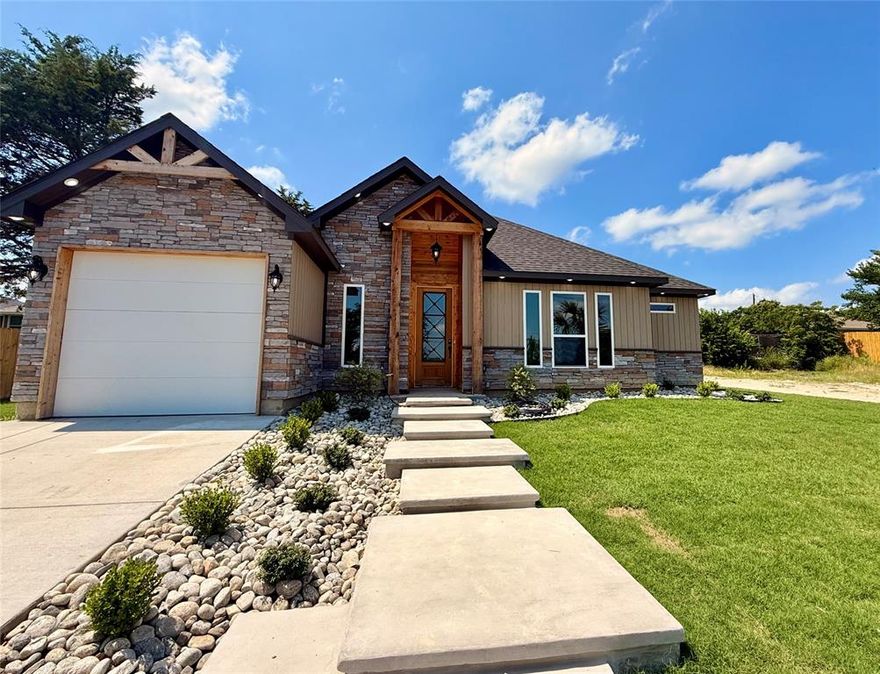 **BACK ON THE MARKET, Buyer terminated for personal reasons unrelated to financing, inspections, or the property.**Discover this exquisite 4-bedroom, 2-bathroom contemporary home nestled in the heart of Oak Cliff. Its captivating curb appeal immediately impresses, with pristine landscaping, a stately palm tree, and modern floating concrete steps guiding you to a sleek front entrance.

Inside, an open-concept design flooded with natural light seamlessly connects the living area and gourmet kitchen. The living room showcases a bold floor-to-ceiling accent wall, adding architectural flair. The chef-inspired kitchen features stainless steel appliances, polished quartz countertops, Koville soft-close cabinetry, and a generous island perfect for hosting.

Designed for smart living, the home is equipped with a central automation hub. Durable porcelain flooring runs throughout, blending style and practicality. The expansive primary suite offers a walk-in closet and a spa-like ensuite bathroom. Additional conveniences include an indoor laundry room, a mud room, and a one-car garage with a smart opener and built-in camera.

Don't miss your chance to own a one-of-a-kind home that combines high-end design with functional living in one of Dallas' most sought-after neighborhoods.