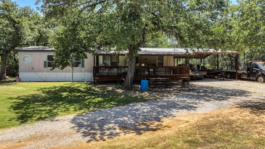 We currently have a local Lender that will loan on this unique property! Don’t miss this versatile property in the highly sought-after Millsap ISD! Situated on just over an acre, this 3-bedroom, 2-bath mobile home features an open layout with a bonus office space, perfect for working from home or creating a hobby room. A covered front patio welcomes you to relax and enjoy peaceful country living while still being close to schools and conveniences.
In addition to the main home, the property includes a 600 sq ft apartment inside the shop, offering excellent flexibility for guests, extended family, or potential rental income. The 24x24 workshop provides plenty of space for projects, storage, or equipment, and the covered parking ensures your vehicles and toys are protected year-round.
With functional indoor and outdoor living spaces, multiple options for housing or income, and the benefit of a desirable school district, this property checks all the boxes. Whether you’re looking for a family home, an investment, or a place with room to spread out, this one is worth a look!