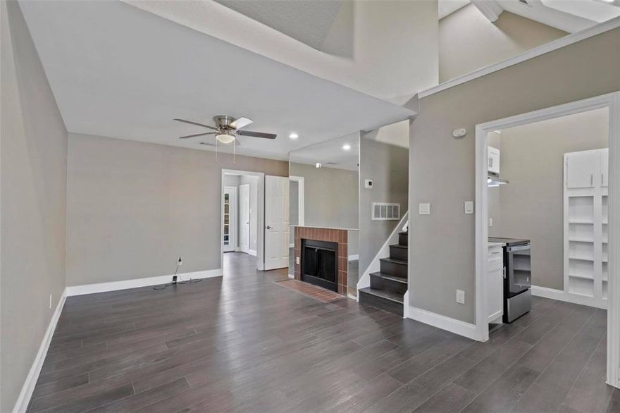 Charming and move-in ready, this beautifully maintained two-story townhome in Eastern Hills offers the perfect blend of comfort, style, and convenience. Ideally located just minutes from Interstate 30 and other major highways, commuting throughout the DFW metroplex is effortless. Step inside to discover rich dark luxury vinyl flooring, soaring high ceilings, and a spacious living room anchored by a cozy fireplace—creating the perfect setting for relaxing or entertaining. The well-appointed kitchen is sure to inspire your inner chef, featuring an abundance of cabinetry, elegant granite countertops, a sleek electric range, and stainless steel appliances. Adjacent to the kitchen, the large dining area offers plenty of space for gatherings and everyday meals. Retreat to the private primary suite complete with an ensuite bathroom, providing comfort and convenience. An additional generously sized bedroom and accompanying full bath make the perfect setup for guests, family, or a home office. Located just minutes from schools, Meadowbrook Golf Course, shopping, dining, and everyday conveniences, this home truly offers everything you need to enjoy the best of DFW living. Don’t miss your opportunity to make this charming townhome your own.