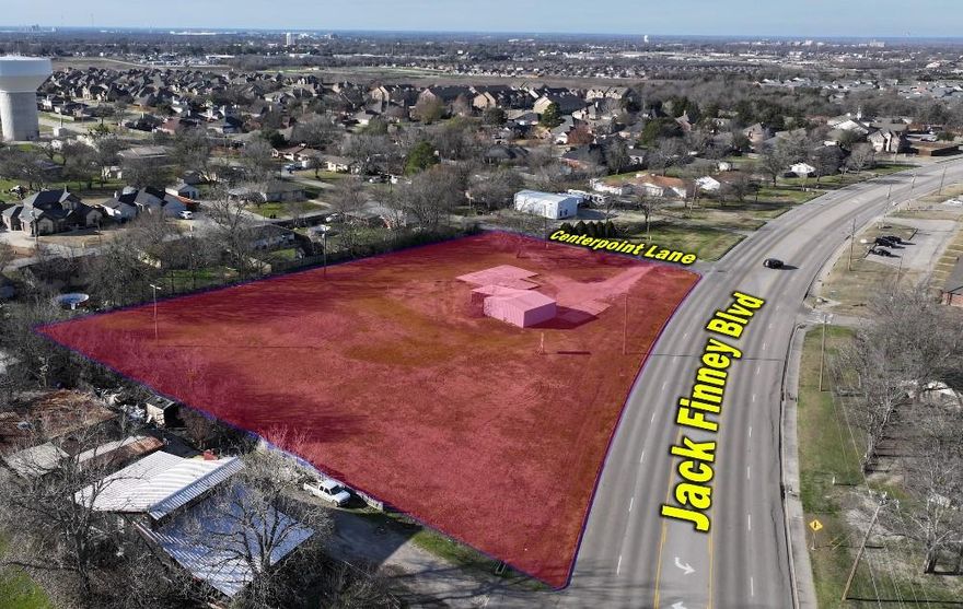 Prime Corner Lot with great visability and high traffic! 2.04 acre (89,472 sq ft). Located on the corner of Jack Finney Blvd (FM 1570) and Centerpoint Lane, less than one mile from L3-Harris and I-30.  Access to city sewer, water and electric.