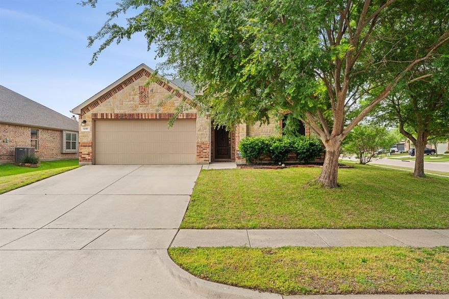 4 bed + private office, 2 bath home in the sought-after West Bend South neighborhood in Burleson, TX.
Built in 2012 with 2,040 sq ft, this home sits on a larger corner lot just under .2 of an acre with mature trees and added privacy only neighbors on two sides. From the moment you walk in, you’ll notice the open entry leading into a spacious living area with a wood-burning fireplace and tall ceilings, giving it a comfortable and inviting feel. The kitchen offers granite countertops, plenty of cabinet space, a bar top for seating, and opens directly to the living room perfect for hosting or everyday life. The standout feature here is the 10x20 covered back patio with stained cedar posts. It’s the kind of space you’ll actually use whether that’s relaxing evenings or having people over. The backyard is fully fenced with mostly newer stained fencing, includes a 6x6 storage shed, and has gates on both sides for easy access. The primary suite is spacious, and the bathroom has been recently remodeled with a more modern style featuring a tiled shower with glass door, soaking tub, gold finished fixtures, and updated tile baseboards built for durability. The walk-in closet is oversized with upper and lower hanging racks plus built-in shelving.
Additional features include newer LVP flooring in common areas, full gutters, and updated paint accents throughout making this home move-in ready. Conveniently located near I-35 with quick access to shopping, dining, and schools. A great fit for someone needing extra space, a functional layout, and a home that’s ready to go without the extra work.