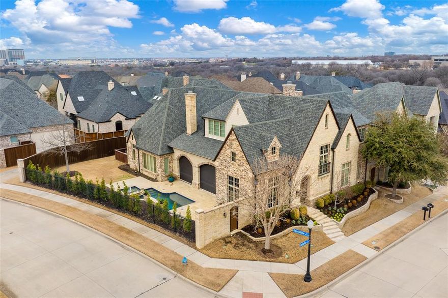 Luxury awaits in Normandy Estates, Plano. This 3-bed, 4-bath home spans 3,851 square feet. Built in 2015, it boasts a stone fireplace in the formal living, and a dry bar with wine cooler in the game room. The chef's kitchen has a large island with sink. You will enjoy Thermador appliances with a large skylight overhead. Relax in the beautiful pool area with outdoor kitchen and covered lounging area. For sunny days there are electric shade screens in the backyard. The master suite opens to the pool through plantation shutters. Views from the pool are breathtaking.  The other bedrooms offer full baths and walk-in closets. Enjoy a 3-car garage and exclusive amenities like a guard-gated entrance, lake with fishing dock, and nature trails. HOA covers facility use, ground maintenance, and security. Experience upscale living – schedule your viewing now!