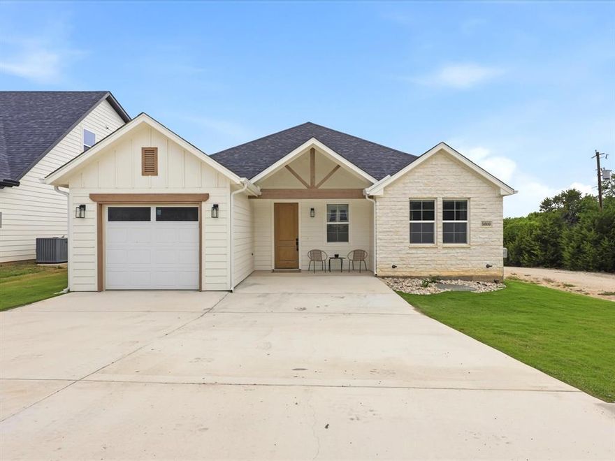 Welcome to this inviting, like-new home offering a rare opportunity to purchase most furnishings—truly more than move in ready! Whether you’re looking for a full-time residence or a short-term rental investment, this home delivers. A fresh farmhouse style blends timeless charm with modern elegance. Enter through a custom 8 ft door into a bright, open floor plan. The chef’s kitchen features granite countertops, custom cabinetry, and a large window that fills the space with natural light. The spacious primary suite includes a spa like, walk in shower and generous closet. Coffered ceilings, stylish laminate flooring, and quality craftsmanship shine throughout. Spray foam insulation ensures energy efficiency and comfort year-round. Located in a gated community with access to boat docks, tennis and basketball courts, and parks, this is a home you don’t want to miss!