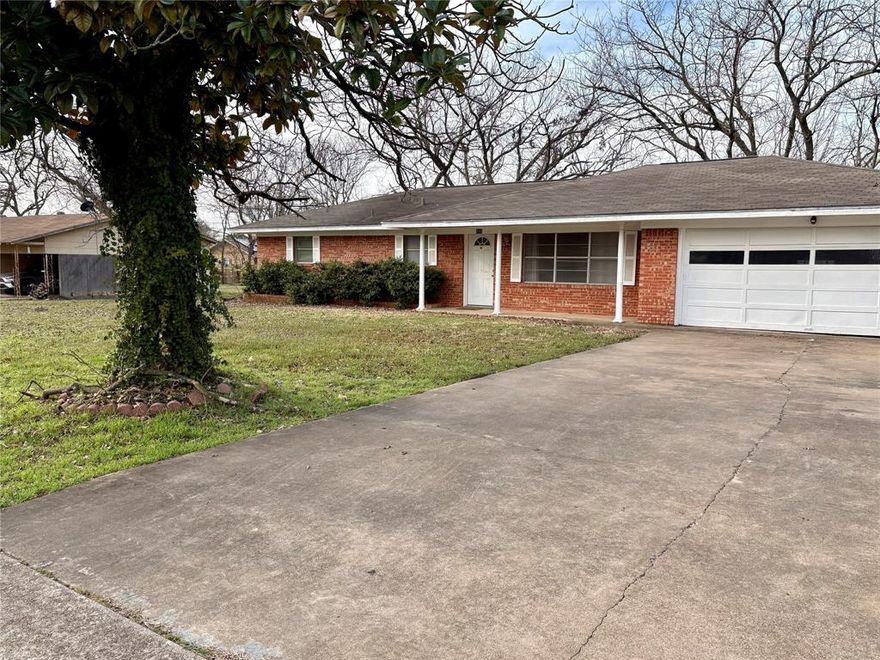 This adorable three bedroom, two bath brick home is situated on over half an acre.  The home features updated paint and floors with just enough projects to make it your own. Mature trees and a fully fenced back yard for anything you could want, make this a property that you don't want to miss.