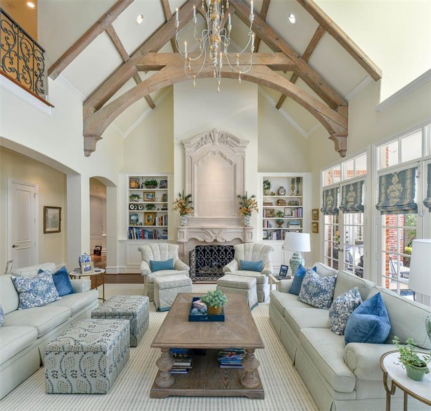 Timeless Traditional! Located on one of the most coveted streets in Preston Hollow with a canopy of heritage trees & country lane feel. Remodeled & updated by one of Dallas' highly regarded builders for his personal residence.  HARD to find true 6 bedroom home with expansive bedrooms & living areas. Shady yard space to the side of the pool enough for play or pets.  3 FP.  Primary suite has sitting area, his & her closets. Guest room down. Study down.
Close to the finest private schools in Dallas. Shopping, restaurants, Central Market & Whole Foods nearby-- walkable! Gleeming wood floors, intricate wood beams, beautiful fireplace mantles and moldings add to the serene ambiance of this well built residence.  Chef's kitchen with 3 ovens, microwave, warming drawer, dual dishwashers, built in Sub Zero refrigerators, ice maker, wine refrigerator & lg. pantry. Enormous laundry room. Plenty of closets throughout. Extra room upstairs for storage or hobby room. Slate roof! Pool, spa & yard too!