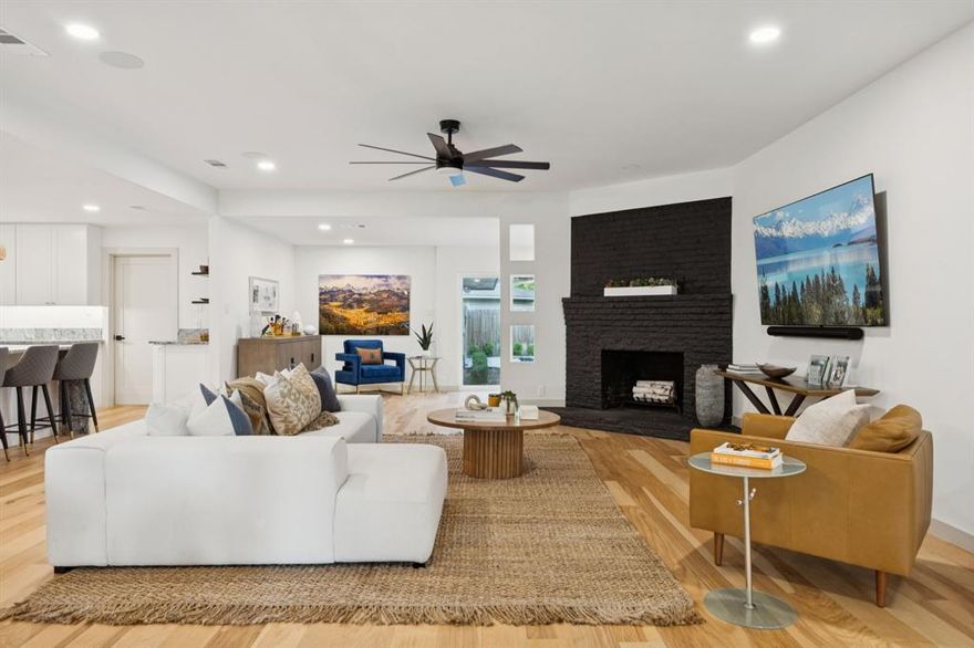 A striking modern ranch in Sparkman Club within 1 block from the clubhouse! Taken to the studs and reimagined with today's luxury finishes, open concept living, generous bedrooms and a gourmet kitchen highlighted by an expansive waterfall leathered countertop island. The newly designed home features a private office framed with iron-and-glass sliders, an expansive family room with decorative fireplace that flows beautifully into the kitchen, dining and secondary lounge space, all enjoying the backyard views, pool-spa retreat. The generous primary suite is tucked away on it's own wing with luxury spa bath including marble shower, soaking tub, dual sinks and large walk-in closet. Three secondary suites with private walk-in closets, a stunning designer bath with shower, and a shared bath with beautiful vanity with double sinks. Replaced roof, windows, doors, HVAC, plumbing, electric, sheetrock, wood flooring, carpet, appliances, reconfigured kitchen and baths, making this the perfect move-in ready home in the much loved Sparkman neighborhood and community. Enjoy your very own sparkling large pool and spa or steps away to the tennis-pickleball courts, community pool and activity center at the clubhouse, surrounded by the best neighbors!