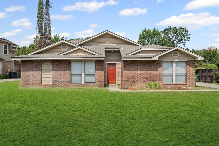 Charming single-story home nestled in the established Oak Branch Estates community! This 3-bedroom, 2-bath residence offers approximately 1,825 sq ft of well-designed living space on a generous lot. Enjoy a spacious living area with a cozy wood-burning fireplace, perfect for relaxing or entertaining, along with a functional layout that includes a separate dining area and an eat-in kitchen. The primary suite is privately situated away from the secondary bedrooms, providing comfort and privacy. Step outside to a covered patio and a large backyard, plus a versatile 20x20 bonus building ideal for a workshop, hobby space, or additional storage.Conveniently located near major highways, shopping, and dining, this home offers both comfort and accessibility in a desirable Arlington location.
