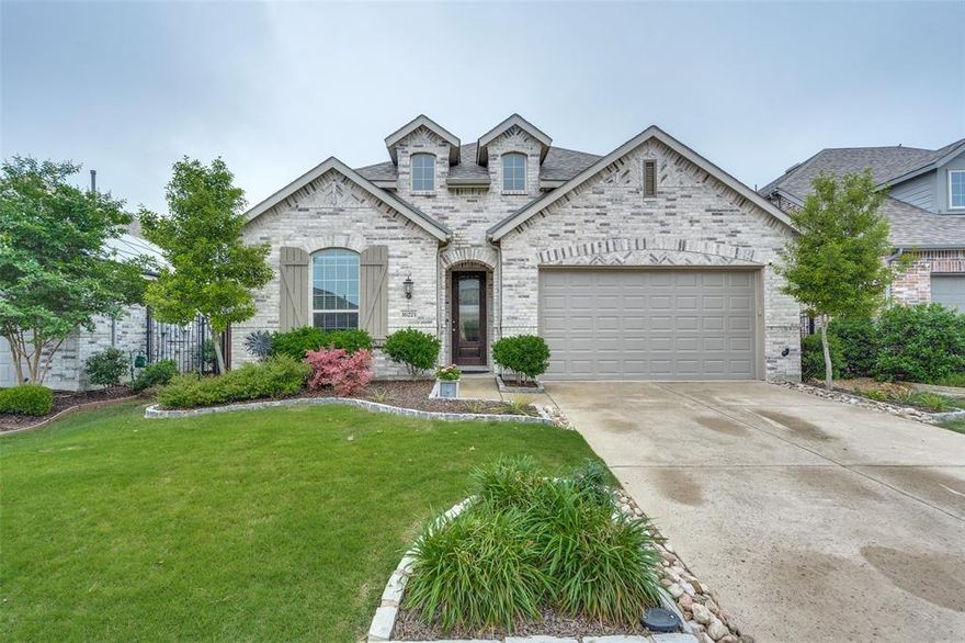 Live the resort life every day in this gorgeous 4-bed, 3-bath plus study,  single story home in sought-after Inspiration and loaded with upgrades.  Extended wood-look floors, granite countertops, huge island, gas cooking and a walkin pantry.  The split master is a peaceful retreat with a great view of the large backyard and the spa like bath has glassed in shower, separate soaking tub, 2 sinks plus vanity and customized walkin closet.  The 4th bedroom is also split with an adjacent bath.  Dedicated study has french doors and the bookcases will remain.  Enjoy lazy afternoons on the lazy river, grab a bite at the community snack bar or take pup to the dog park.  Stay active with miles of walking trails, a state-of-the-art fitness center, putting greens, sand volleyball, and not just one but five pools.  And when adventure calls, nearby tails lead you straight to the scenic Trinity Trail around Lake Lavon. Buyer to purchase a new survey.  Call agent for the exclusions.  Washer, Dryer, Refrigerator remain with the house as well as the Ringbell Alarm system & 2 security cameras. Most closets have customized shelving.  There is even two exterior water faucets.  Property is pristine and mint condition. and easy to show. See Private Remarks about School zoning.