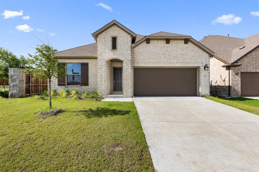 Welcome to 2160 Clearwater Way — a lightly lived-in, like-new home on a premium lot backing to the community pond, with over $40,000 in high-end builder upgrades. This 4-bedroom, 3-bath with a large office home offers modern style, smart design, and peaceful views in one of Royse City’s fastest-growing communities. Built just a year ago and meticulously maintained, the home features an open-concept layout with upgraded wood-look laminate flooring throughout, a chef-style kitchen with a large island, quartzite and solid surface countertops, stainless steel appliances, and designer backsplash. The spacious living and dining areas are filled with natural light and ideal for entertaining. The private primary suite includes a spa-like bathroom with dual vanities, a walk-in shower with custom tile, and a large walk-in closet. A second suite with its own private full bath offers the perfect setup for multi-generational living, guests, or an older child. Two additional bedrooms provide even more flexibility for family or office space.
Step outside to a covered patio and enjoy serene water views with no rear neighbors — one of the best lots in the neighborhood. This move-in ready home combines comfort, style, and location — just minutes from shopping, schools, and major highways.