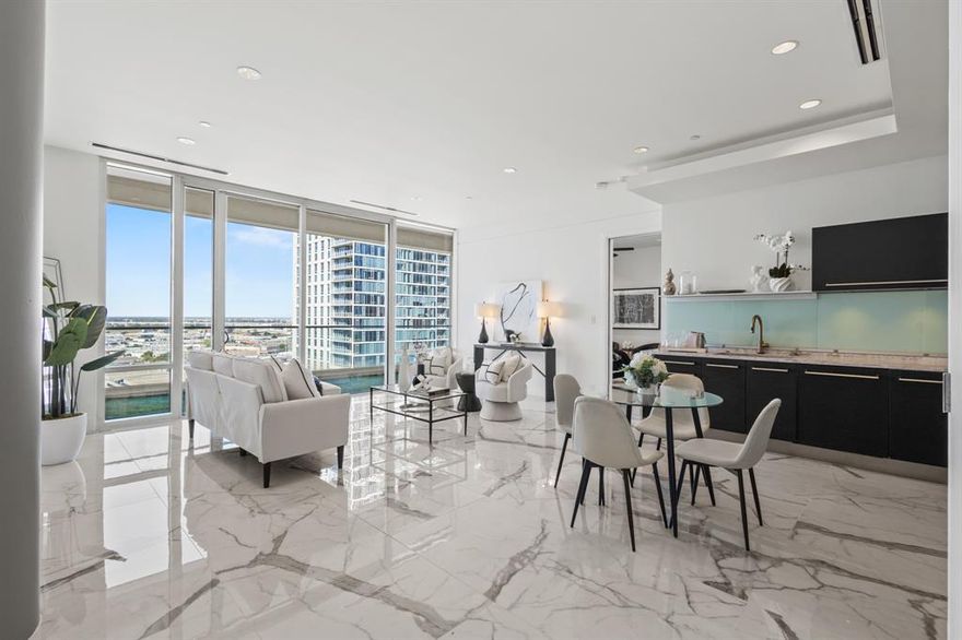 Experience elevated style in this stunning 2 bed, 2 bath condo on the 11th floor of the exclusive South Tower Residences at the W Hotel in Victory Park. Soak in iconic views of the Margaret Hunt Hill Bridge from both the living room and primary suite, or unwind on your oversized balcony as the sun sets over Dallas. Inside, you’ll find marble floors, Lutron shades, California Closets, Sub-Zero appliances, and a spa-worthy primary bath with a soaking tub and rainmaker shower. Enjoy the ultimate W lifestyle with 24-hour concierge service, 2 resort-style pools, state-of-the-art fitness centers, a luxury day spa, and valet parking, all just steps from the city’s best dining and entertainment.