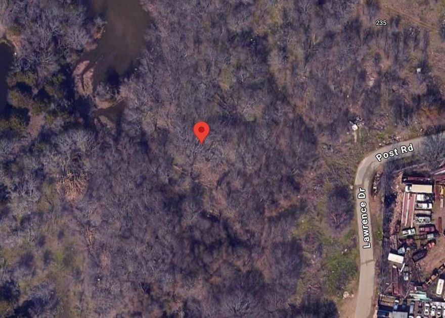 Discover the perfect opportunity to own nearly an acre of land in the heart of Balch Springs! This .99-acre lot offers a serene, natural setting with mature trees throughout and a peaceful pond that enhances the property’s charm and privacy. Accessed via an unimproved road, this property has the charm of country living while still being just minutes from city conveniences, major highways, shopping, and schools. With its heavily wooded landscape, the lot provides excellent privacy and endless possibilities for a custom home.