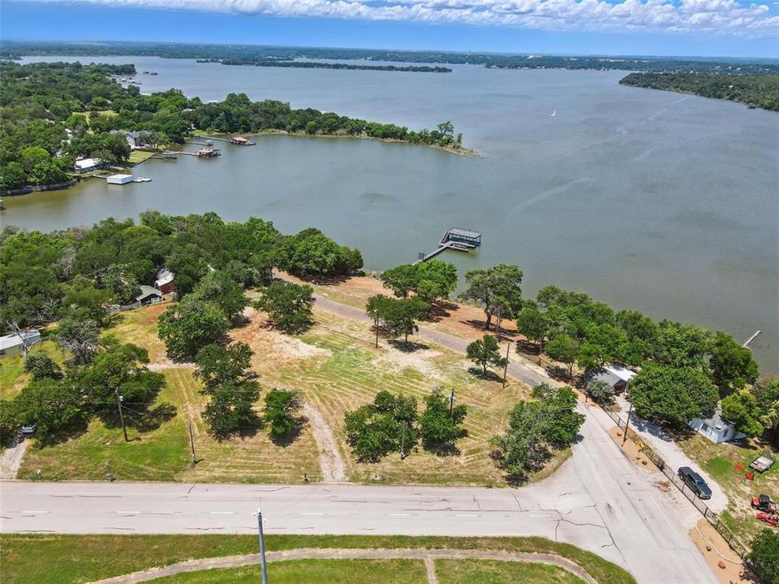 Looking for deeded waterfront property with space to build your dream home and private dock? This beautiful building lot sits on a gentle hill overlooking the open water of Lake Worth, offering sweeping views and endless potential.   With permanent easement lake access, you have the rare opportunity to build a custom dock to suit your lifestyle—whether it’s boating, jet skiing, fishing, or simply enjoying sunset views over the water. Imagine having your own personal spot to take in fireworks, the Joint Reserve Base Air Show, and even a glimpse of the downtown Fort Worth skyline.
  Enjoy lakeside living with easy access to highways, shopping, and just 15 minutes to downtown. Whether you're planning a weekend escape or a full-time residence, this property offers the perfect canvas. Come enjoy the view and create your own waterfront dream!