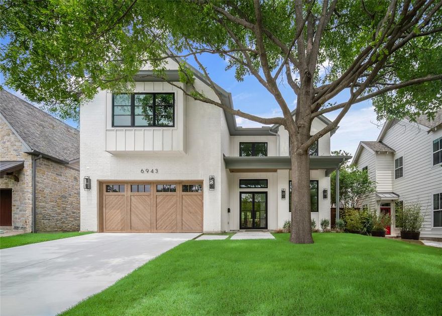 Step into timeless elegance in the heart of Lakewood Hills. This thoughtfully designed home captures the very best of luxury while embracing the effortless lifestyle this coveted community is known for. Short walk to the trails leading to White Rock Lake and Lakewood Country Club, every day feels like a retreat. Welcomed by the glass doors, find warm herringbone hardwoods, arched bar w antiqued mirror details. Enter to find a vibrant, color-drenched office & a show-stopping kitchen that dazzles w White Silk Quartzite countertops & backsplash, rich blonde oak cabinetry, Wolf gas range, built-in refrigerator and a spacious pass-through butler’s pantry complete with prep sink. Tucked across from the office is a stunning powder bath featuring a floating Calacatta Marble vanity. At the rear of the home, you’ll find a serene guest suite with cathedral ceilings and bath dressed in marble counters, dual sinks, champagne bronze fixtures and a soft baby-blue tiled walk-in shower. Now, prepare to be impressed by the private primary suite. Accessed through its own elegant vestibule, this secluded retreat opens to a private veranda and includes a morning coffee bar, reeded white oak millwork and a luxurious bath featuring Zellige and marble-inspired tile, Biancatto leathered quartzite countertops and a dramatic wet room with a freestanding vessel tub and an expansive shower complete with rainfall showerhead. The oversized primary closet connects directly to the laundry room for ultimate convenience. Upstairs, the fun continues with a generous game room featuring its own bar, plus two additional ensuite bedrooms—ideal for guests, teens, or a growing family. This home includes CAT-6E pre-wiring, spray foam insulation, a tankless water heater, piered-slab foundation, and comes with the trusted Maverick® 1-2-10 Builder’s Warranty. Sophisticated, functional, and full of heart...this is more than a home. It’s where unforgettable moments begin.