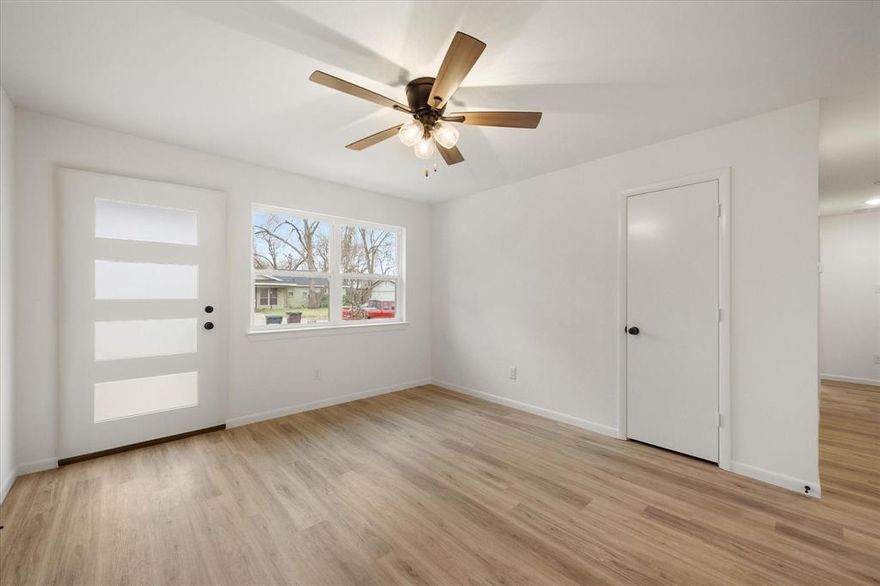 OHHHH SOOOO CUTE LIGHT BRIGHT AND OPEN ENERGY EFFICIENT 3 BEDROOM 2 BATH HOME FULLY UPDATED IN DESIGNER NEUTRALS. To help minimize your electric bills, this  precious property has foam insulation throughout, including garage, an insulated garage door, a gas tankless water heater, and a gas range which should please the chef in the family. Kitchen has ample prep space with granite countertops, plenty of room for a rolling island, and opens to a large dining or breakfast room. The flooring is appealing luxury vinyl planking in all common and wet areas, with stylish carpet in bedrooms. Primary bedroom is ensuite and the bathroom has a large walk in shower. Conveniently located close to schools, restaurants, shopping, and major roadways. Buyer to verify square footage and schools.