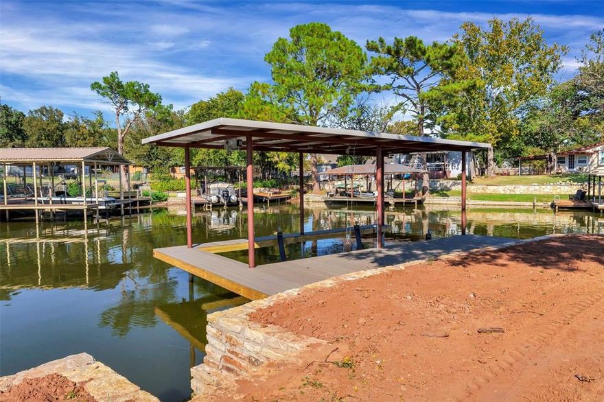 Get ready to kick back and enjoy the lake life! This completely updated lakefront home has it all — new HVAC, roof, siding, flooring, paint, boat docks, and more. Seriously, too many updates to list!
You’ll love the 180-degree lake views right from your back porch and the oversized lot that gives you plenty of room to spread out, entertain, or just relax by the water. Whether you’re spending weekends on the boat, hosting friends for a cookout, or watching the sunset with a drink in hand, this spot is made for making memories.
Turnkey and ready for you to start living the lake life!