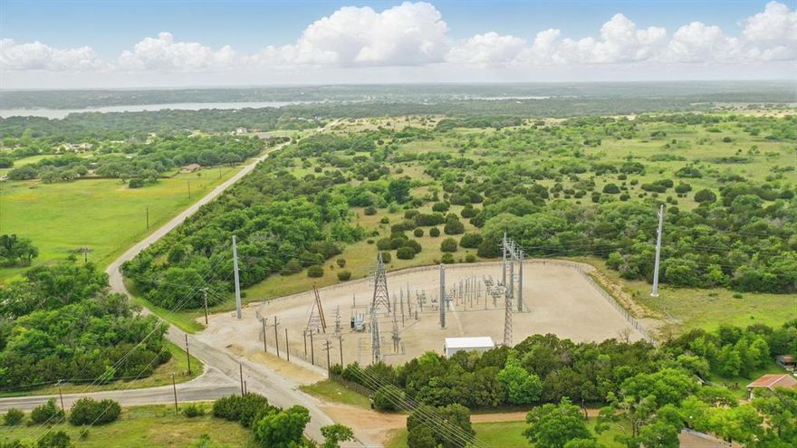 Incredible opportunity to own 292 acres of prime real estate in rapidly growing eastern Parker County, just north of Willow Park. With its unbeatable location—only 20 miles to Fort Worth and 11 miles to Weatherford—this property offers endless potential for residential development, commercial ventures, or long-term investment. The land is currently under an agricultural exemption and features expansive open acreage with excellent road frontage. Heavy power lines traverse the property, and a power substation is located directly across the road, offering substantial utility infrastructure for future projects. Whether you're looking to create a master-planned community, establish a business hub, or invest in one of the most sought-after areas in North Texas, this property checks all the boxes. Don’t miss this rare chance to secure a large tract in a premier location.