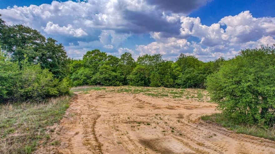 Welcome to SaddleCrest, where your equestrian dreams come to life! Nestled at the end of a serene cul-de-sac, this stunning 8+ acre property offers a unique blend of natural beauty. The highly coveted and esteemed SaddleCrest Estates is ALMOST SOLD OUT! It’s easy to see why this tranquil, trendsetter of a subdivision is in-demand in North Weatherford. Winding roads and varying terrain make these lots unique and full of character. SaddleCrest Estates is equestrian-inspired, allowing you to keep your four-legged family on property, next to your dream home. Install a private water well for NO WATER BILL, and celebrate NO CITY TAXES! Work from home? Experience no lag with HIGH-SPEED AT&T FIBER being installed! There’s no bothersome HOA, yet SaddleCrest Estates is deed restricted to protect your investment. You'll find buyer-friendly restrictions that are sensible for country living such as, guest house or second homes allowed and no time limit from purchase to begin construction. At SaddleCrest Estates, you can buy now and build later.  SaddleCrest is more than a property; it’s a lifestyle waiting for you to embrace. Don’t miss this opportunity to create your dream home in a community where your four-legged family can thrive! Txt keyword SADDLE2 to 88000 for inventory. Limited lots remaining but there are also new construction homes ready for you to choose from!