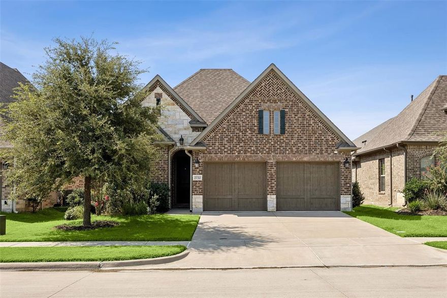 Beautiful, move-in ready one-story home in the quiet, established Waterford Point neighborhood, just a short walk from the scenic shores of Lake Lewisville. This gorgeous property impresses at every turn with an open-concept floorplan that creates a light and airy feel, enhanced by abundant natural light and a fresh, neutral color palette. At the heart of the home is the expansive living room with a cozy corner fireplace, seamlessly connected to the sunlit dining area and stunning gourmet kitchen. The kitchen is a chef’s delight, boasting a large island breakfast bar, abundant crisp white cabinetry, a spacious walk-in pantry, stainless steel appliances including a gas cooktop, and a designer tile backsplash that adds the perfect touch of style. The tranquil primary suite is privately tucked away at the back of the home and features a spa-like bath with soaking tub, oversized walk-in shower, and a large walk-in closet with convenient access to the laundry room. Enjoy the outdoors year-round on the covered patio overlooking the backyard. An attached two-car garage adds security, storage, and everyday convenience. Addes bonus, seller including Samsung Washer & Dryer, Refrigerator and 75-inch TV in the living room with the sale of the home. Don’t miss this rare opportunity to call this Waterford Point gem your home—schedule your private tour today!