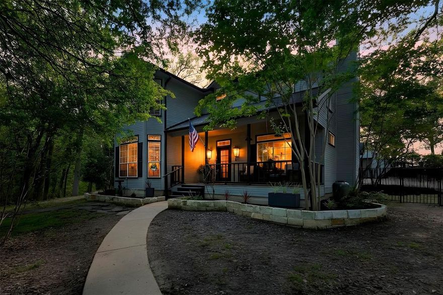 Escape to your private sanctuary in Hidden Hills, McKinney. This beautifully updated 3,454 sq. ft. home (built in 1992) sits on 2.319 acres, surrounded by mature trees and offering unparalleled privacy. A charming front porch welcomes you into a warm, inviting interior with abundant natural light and stylish modern fixtures. The main home offers a cozy living area with a woodburning stove, a well-appointed kitchen with plentiful cabinetry, and a convenient downstairs primary suite. Upstairs, you’ll find three bedrooms and a full bath, plus a half bath downstairs. Step outside to a deck, an above ground pool, and main house with fenced backyard perfect pets, for relaxing or entertaining. The separate guest house is a dream: it features its own living area with woodburning stove, kitchen, dining area, office has built in murphy bed, primary bedroom, full bath, a half bath, and plenty of storage, partially covered deck with small fenced in yard. With 2 oversized 2 car garages, separate storage building, huge yard, a deck, this home is your perfect blend of comfort, style, and privacy. Don’t miss this rare find!