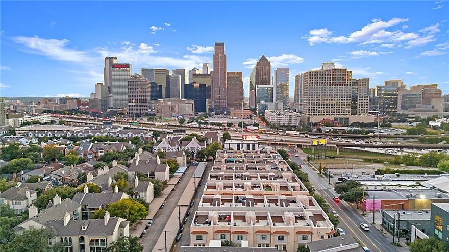 New PRICE IMPROVEMENT! Landlord pays for city sewer + water. Set in Bryan Place’s Veranda Condominiums, this address puts you steps from green space at Exall Park and a quick hop to Griggs Park, the Arts District, and the Dallas Farmers Market. Weekends flow from Klyde Warren Park events to Deep Ellum dining, and weekday commutes are simplified with nearby DART rail at Pearl-Arts District and Cityplace-Uptown. Available for IMMEDIATE move-in, this fully UPDATED 3-bed, 3.5-bath condo (approx. 1,955 SF) blends style and convenience. Primary suite offers great closet space and a spa-style bath.  Renovated 1 year ago with new wood floors throughout and fresh paint, the home features a sleek kitchen with dishwasher, in-unit washer & dryer, and spacious living-dining for easy entertaining.  Head upstairs to the furnished ROOFTOP PATIO with a BBQ GRILL, showcasing sweeping city views, perfect for morning coffee or sunset hangs.  Minimum lease term is 6 months. Pets welcome and subject to landlord approval. This one checks all the boxes for comfort, function, and fun.