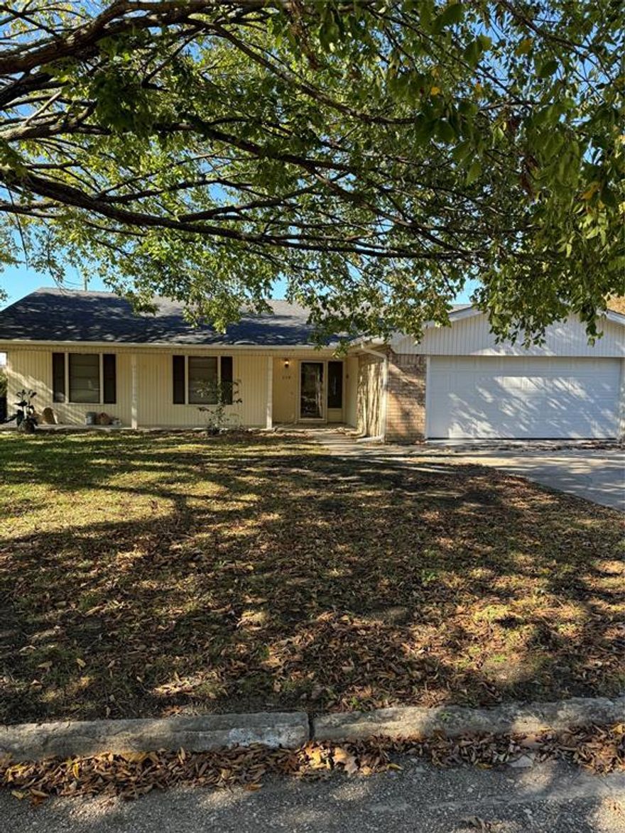 Beautiful 4 bedroom, 2 bath home in a great location in Van Alstyne. Large living room with a wood burning fireplace, open to large dining room.  Cute breakfast nook with a spacious kitchen with utility room attached. Large bedrooms. Fenced backyard.