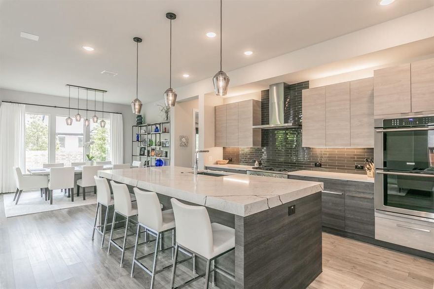 Step into sophisticated elegance with this architecturally stunning contemporary estate nestled in one of Colleyville’s most coveted neighborhoods. This custom-designed masterpiece offers the perfect balance of sleek design and timeless luxury, featuring over 4,000 SqFt of open-concept living space infused with natural light, clean lines, and designer finishes throughout. From the moment you enter, you're greeted by soaring ceilings, expansive windows, and seamless indoor-outdoor flow that embodies modern Texas living. The gourmet chef’s kitchen is a showstopper, equipped with top-of-the-line appliances, quartz countertops, a waterfall island, and a bonus butler's pantry. The lavish primary suite is a sanctuary, offering a spa-like bath with a soaking tub, oversized shower, dual vanities, and a walk-in closet worthy of a boutique. Secondary bedrooms are generously sized, each with ensuite baths and designer finishes. Don't forget about the complete surround sound movie room and game room on the second level. With proximity to top-rated GCISD schools, upscale shopping, and fine dining, this home delivers a lifestyle that’s truly unmatched in Colleyville. Don't miss out on this stunning home. This home conveys with several extra perks, check out the transaction documents.