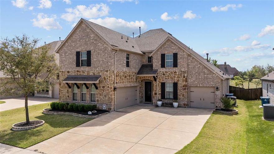 Located in the sought after Vineyards community with easy access to Lake Ray Hubbard, Lakeside Park, & Paddle Point Park, this beautifully designed PRE-INSPECTED 4 bedroom, 4.5 bath home with over 3,800 sq ft offers a perfect combination of space & functionality in one of Rowlett’s most desirable settings. Enjoy nearby walking paths, kayaking, fishing, volleyball, playground, community pool, & some of the most scenic sunsets in the area, all just moments from the property. Inside, soaring ceilings, striking spiral staircase, & a living room anchored by 20 foot ceilings create an open setting ideal for everyday living & entertaining. The versatile layout features a primary suite downstairs along with an additional bedroom on the main level, offering flexibility for multigenerational living or extended stays. A dedicated office or flex space provides a quiet workspace, while the spacious game room & media room deliver multiple areas for relaxation & recreation. One of the upstairs bedrooms includes its own private bathroom, offering the potential for a second primary suite or ideal guest retreat. The kitchen is well appointed & enhanced by a butler’s pantry, adding convenience & additional storage while seamlessly connecting the main living & dining areas. The primary suite offers a private retreat with ample space, a sitting area, & a well designed layout. Step outside to a custom covered back porch complete with a fireplace, creating a warm & inviting outdoor living space ideal for hosting, relaxing, or enjoying the peaceful setting year round. The home also features a 3 car garage & an oversized driveway. Thoughtfully selected upgrades were incorporated at the time of construction, adding to the overall quality & appeal of the home. Convenient access to Interstate 30 Texas, President George Bush Turnpike, & Texas State Highway 66, along with close proximity to grocery stores, shopping & dining, enhances the overall lifestyle & accessibility this location provides.