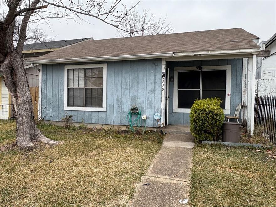 Great investor opportunity with strong potential for renovation and resale. This 2-bedroom, 1-bath home offers 906 square feet and a solid foundation to bring your vision to life. Features include carpet throughout, a quaint fenced backyard suitable for outdoor use, and alley access to the rear garage. Windows are currently boarded for security purposes. HVAC: heat is operational; air conditioning will require replacement. Property is being sold as-is. Conveniently located and ready for improvement. Schedule a showing to explore the possibilities!