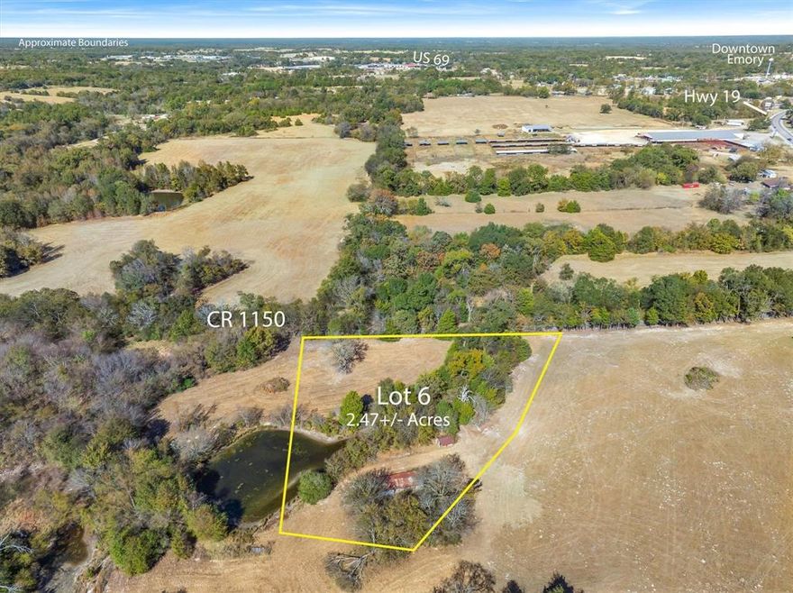PRIME 2.47± ACRE COMMERCIAL LOT IN EMORY, TEXAS! Exceptional commercial opportunity, for almost 2.5 acres down a tree-lined County Road, that adjoins Commercial Corner Lot #1 and-or Lot # 2 with great visibilty on State Highway 19 - located inside the expanding Emory city limits. This 2.47± acre tract (Commercial LOT#6) offers more than 380' of frontage on RS County Road 1150, providing outstanding exposure and easy access for a wide range of commercial uses. Recently zoned Commercial, but could easliy be zoned residential as well....with city & county utilities & services nearby, the property sits just over one mile from downtown Emory, just off SH -19. The location offers immediate development potential or long-term investment value in a market known for strong community pride and a welcoming small-town feel. Emory continues to grow, supported by its position between Lake Fork & Lake Tawakoni and its proximity to the DFW Metroplex and Tyler—driving demand in tourism, retail, and local services. Addt'l. ADJOINING Commercial Lots &-or Residential Lots are available. Seller is open to flexible subdivision or combinations of lots to accommodate buyer requirements, making this site well suitable for retail, local services, hospitality, or mixed-use development. The land has clearings, beautiful woods & a slight roll, with sandy soil & this this lot has no flood plan. This exceptional location offers easy access from SH 19. This lot, has an old pole barn building & shed (assigned no value) from the days of the Emory Archer Club, & overlooks the neighboring Residential Lot # 7's serene pond. Seller financing is available & with various lot options offered from 2-6.9 acres (which can be combined) - options to suit your business need are endless. If you are considering one of the adjoining Resdential Lots (Lot # 7 or 7 & 8 combined) this Lot could provide additional acreage, if desired. All lots contracted will be platted prior to Closing. More info needed? Contact Agent