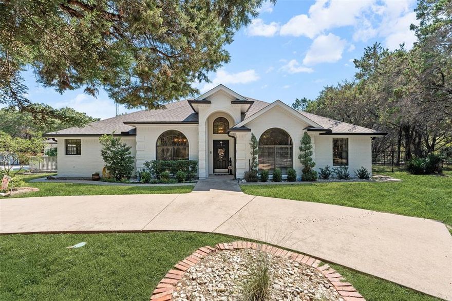 Welcome to Your Dream Home in Crawford ISD!

Discover this stunning, fully renovated single-story residence nestled on 2.5 wooded acres in the desirable North Bosque Estates. Offering 2,791 sq. ft. of refined living space, this home beautifully blends modern luxury with natural tranquility.

A graceful circle driveway leads to a 2-car garage and 3-car carport, providing ample parking for family and guests. A new fence enhances privacy on one side, while the remaining acreage showcases unobstructed wooded views.

Inside, timeless elegance defines the home. The main living area features soaring ceilings, large windows, and a double-sided see-through fireplace serving as a stunning centerpiece between living spaces.

The chef-inspired kitchen boasts a spacious center island, induction cooktop, and smart appliances, blending style and function for everyday living or entertaining.

Three spacious bedrooms and two and a half baths include a primary suite retreat with a spa-like bath, free-standing soaking tub, oversized shower, and elegant finishes for ultimate relaxation.

A second living area or game room adds versatility for a playroom, office, or media space. Expansive sliding glass doors frame breathtaking wooded views, perfectly merging indoor comfort with outdoor serenity.

Outdoor living shines with an above-ground pool, deck and bar area, plus multiple patios and landscaped pathways illuminated by ambient lighting—ideal for entertaining or unwinding under the stars. Two 50-amp hookups offer convenient RV or camper parking.

Privately located at the back of North Bosque Estates, this property offers the perfect balance of sophistication, comfort, and country peace—a true modern retreat surrounded by nature’s beauty.

Experience luxury, privacy, and serenity—all in one exceptional home.